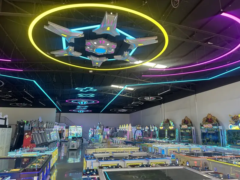 Skill game cabinets and amusement machines on an assembled product row